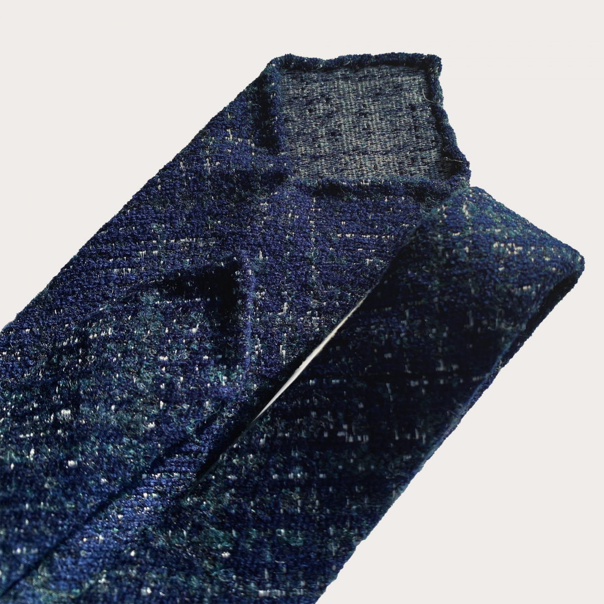 Unlined necktie in wool and silk, blue and green tartan