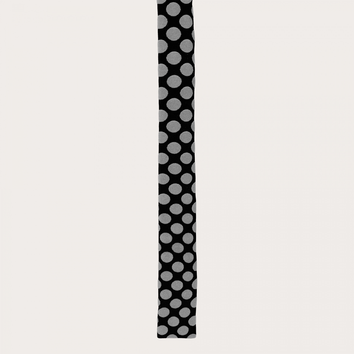 Narrow silk necktie with square end, black with white polka dots