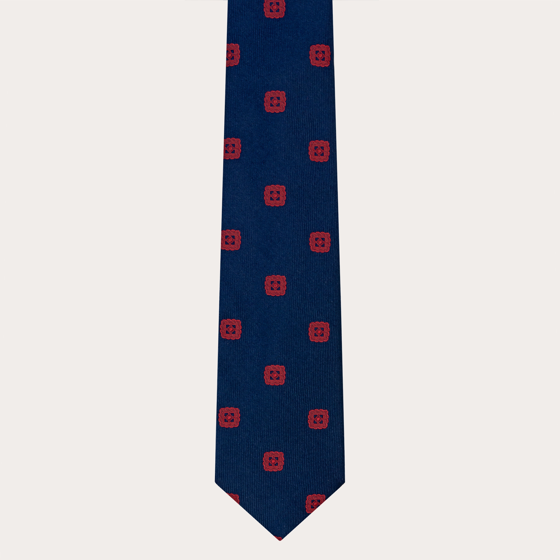 Corbata elegante en jacquard de seda azul con bordado rojo