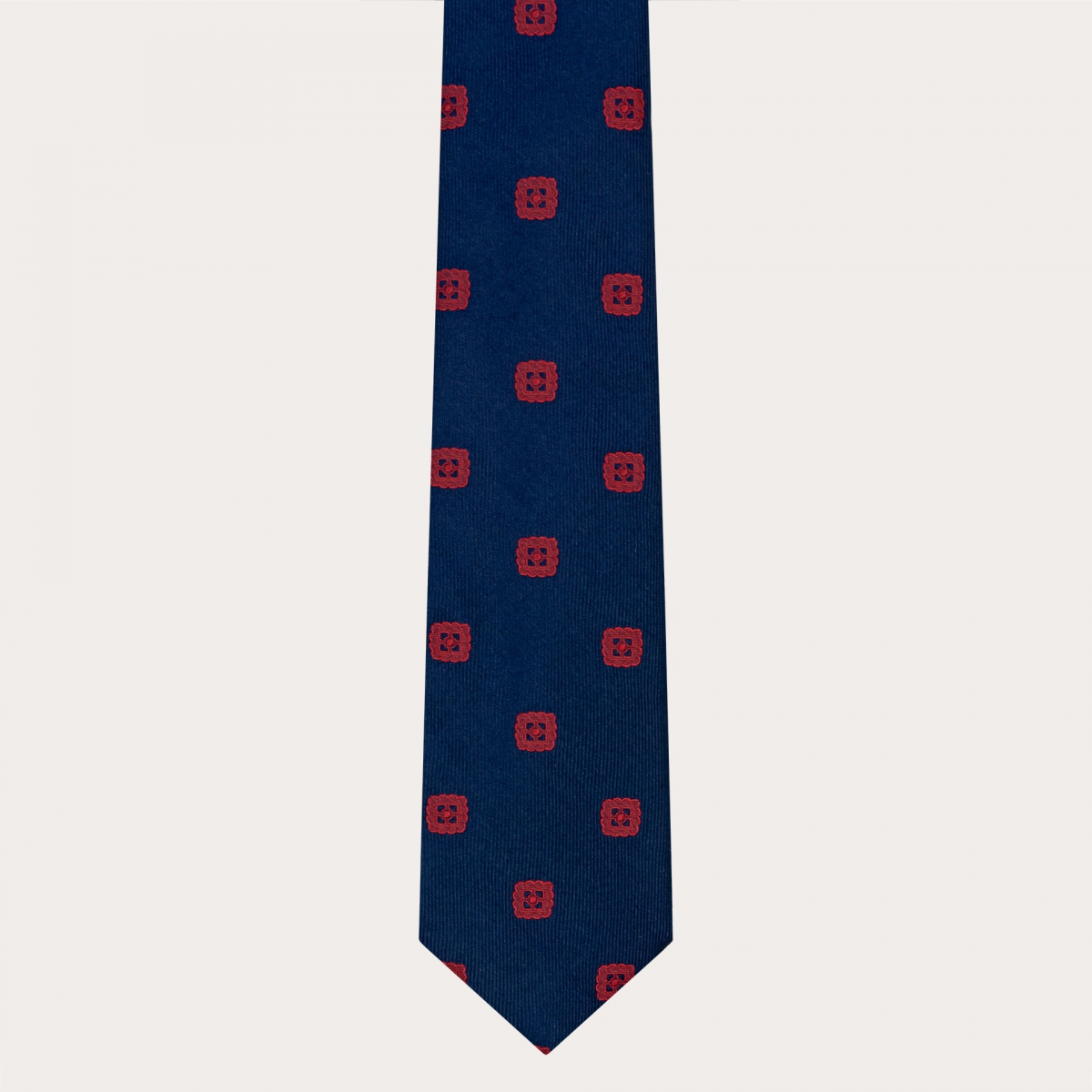 Corbata elegante en jacquard de seda azul con bordado rojo