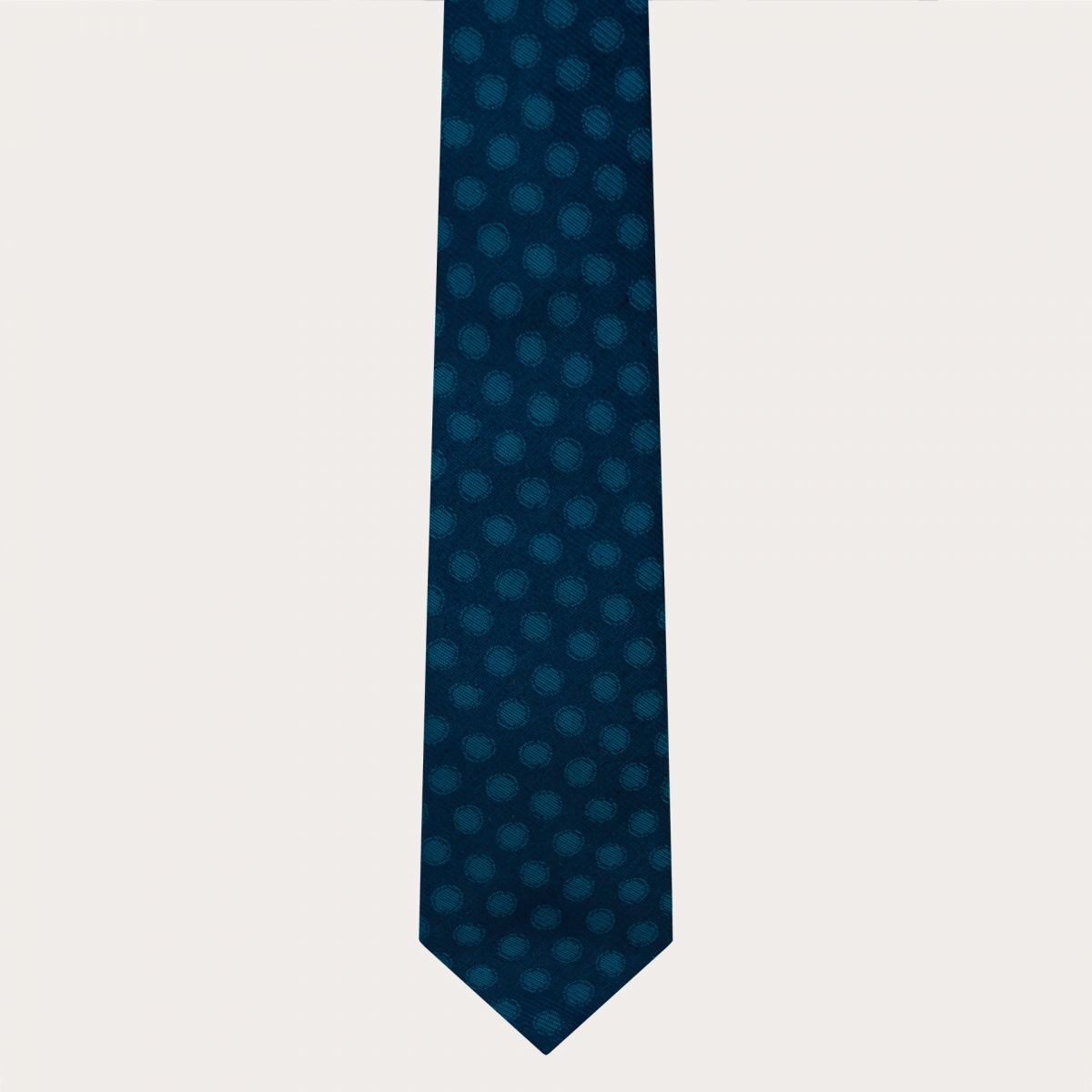 Elegante corbata de seda azul con lunares petróleo