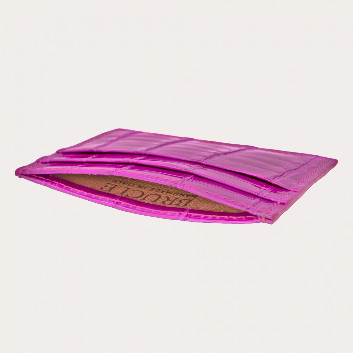 Tarjetero de cocodrilo fucsia