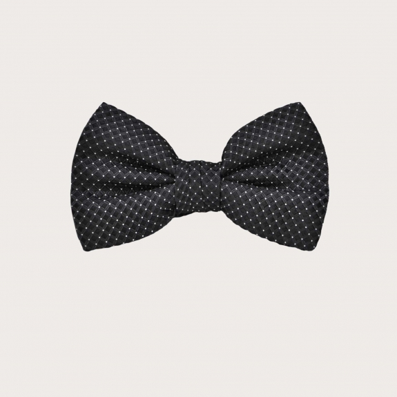 Elegant black bow tie with white polka dots for children