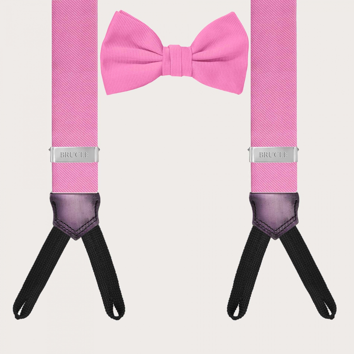 Clásico y original set de tirantes para botones y pajarita rosa coordinada en seda jacquard.