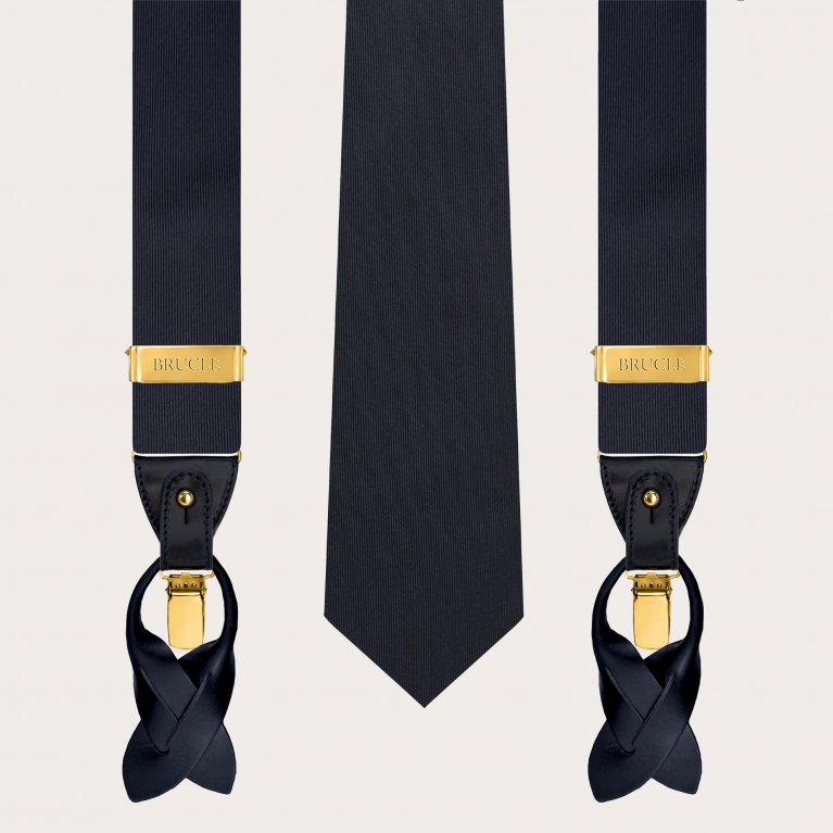 Suspenders with gold clips and coordinated navy blue silk tie