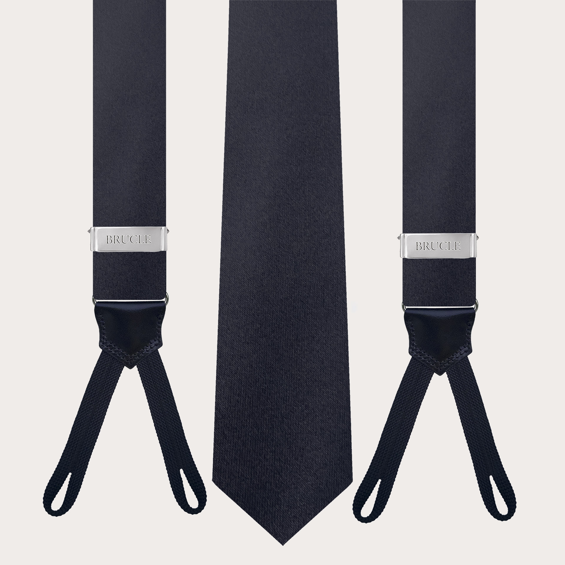 Coordinated set of navy blue silk tie and button suspenders