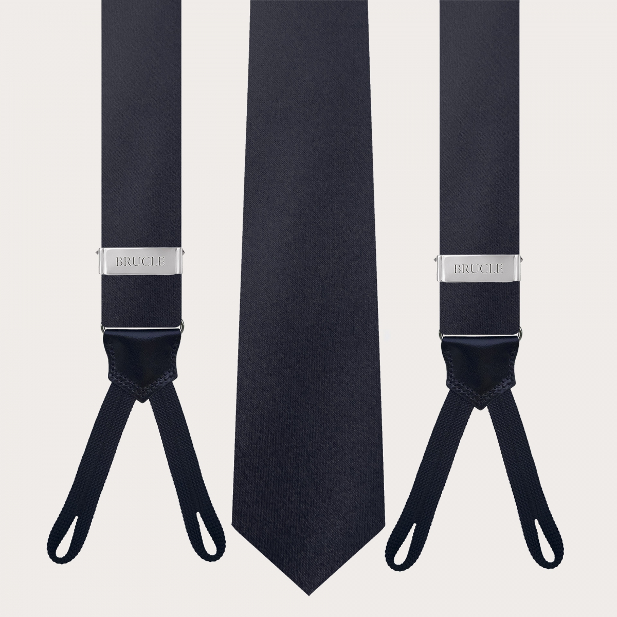 Coordinated set of navy blue silk tie and button suspenders