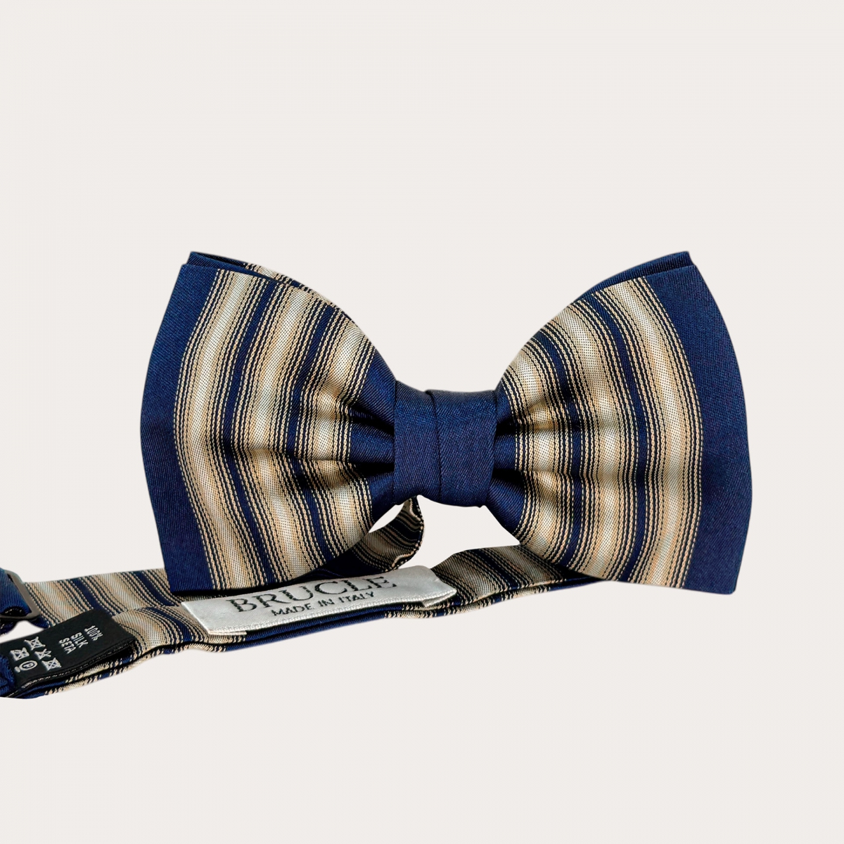 Blue and gold vertically striped bow tie