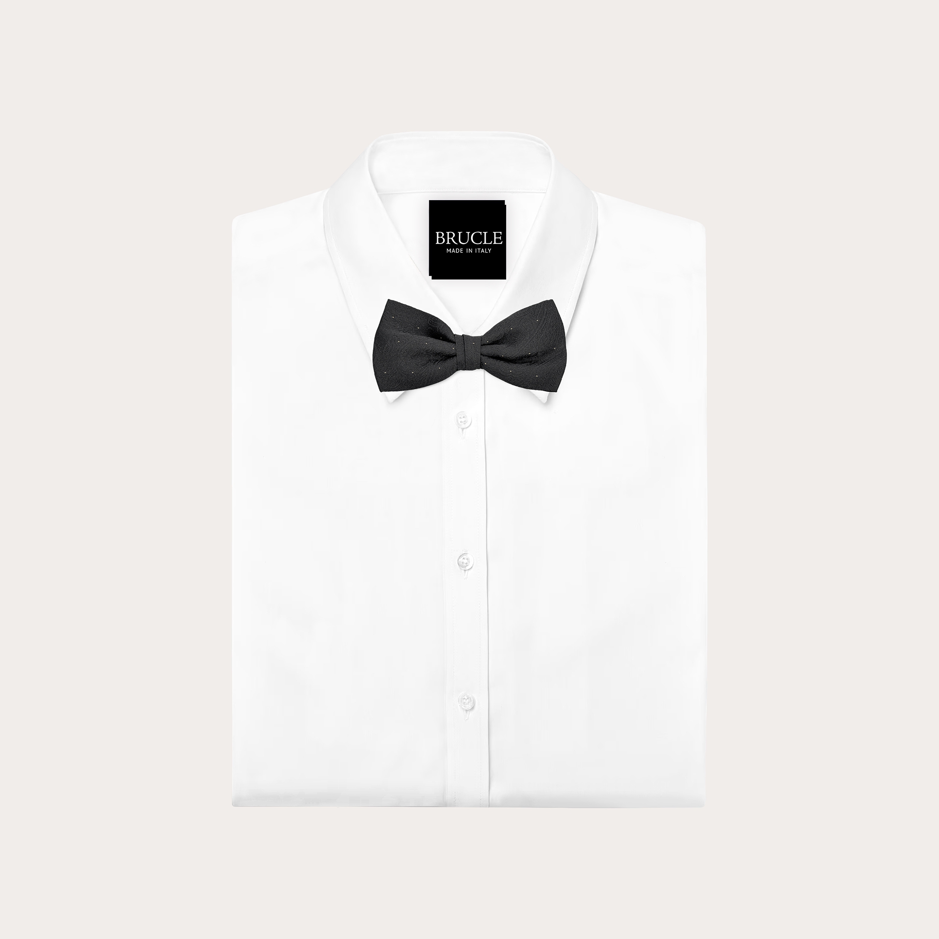 Black silk bow tie with tone-on-tone paisley pattern and gold stick pin