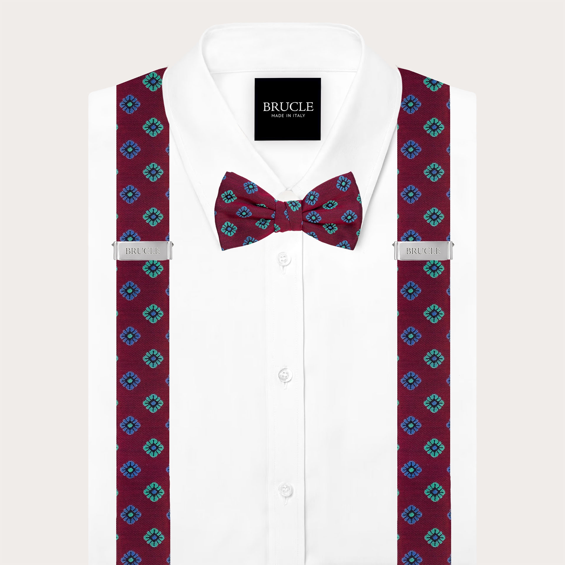 Coordinated suspenders and bow tie in bordeaux floral silkaDual-purpose suspenders and matching floral burgundy silk bow tie