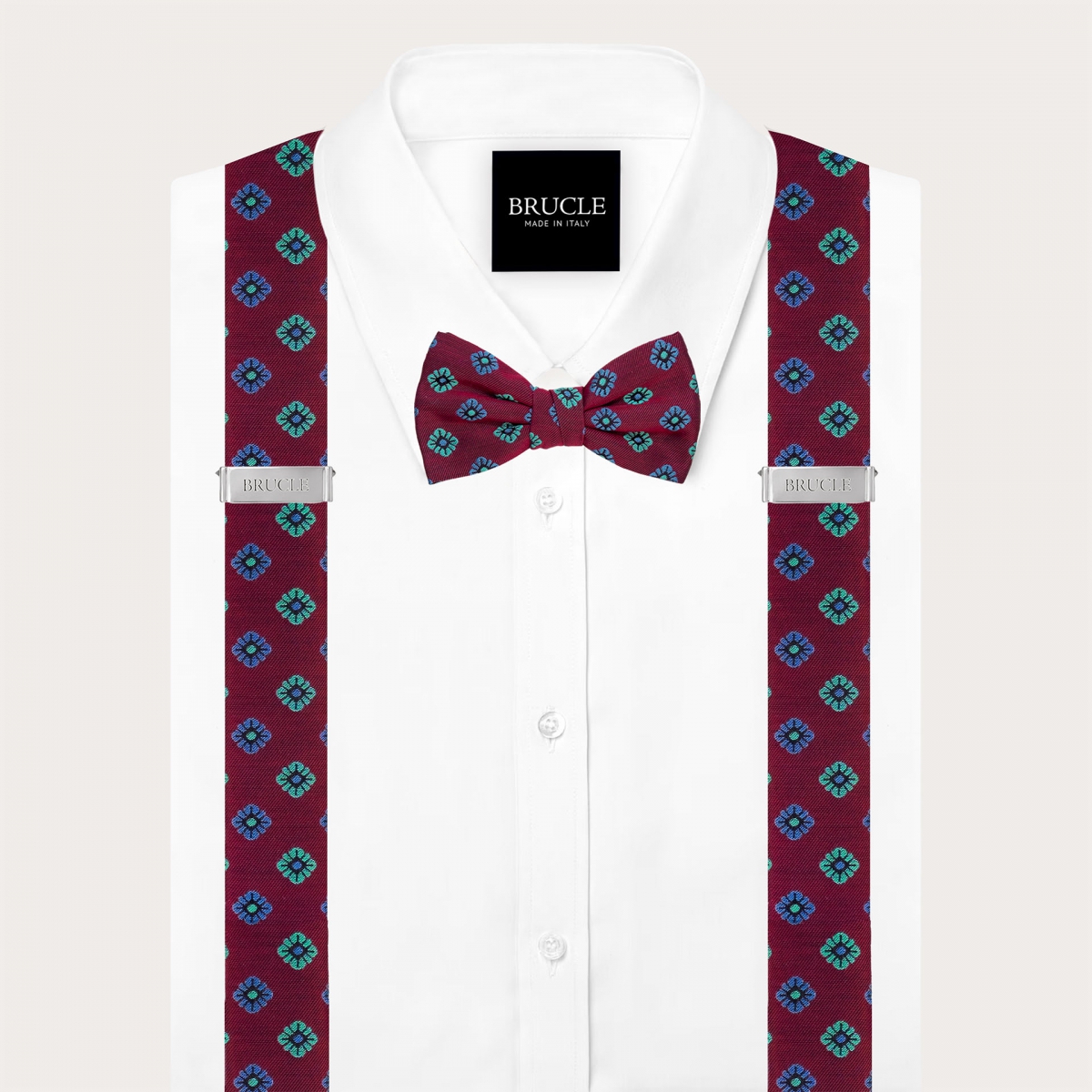 Coordinated suspenders and bow tie in bordeaux floral silkaDual-purpose suspenders and matching floral burgundy silk bow tie