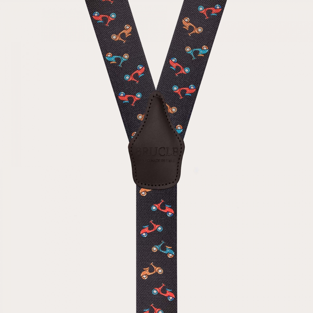 Brown suspenders with clips and scooter pattern