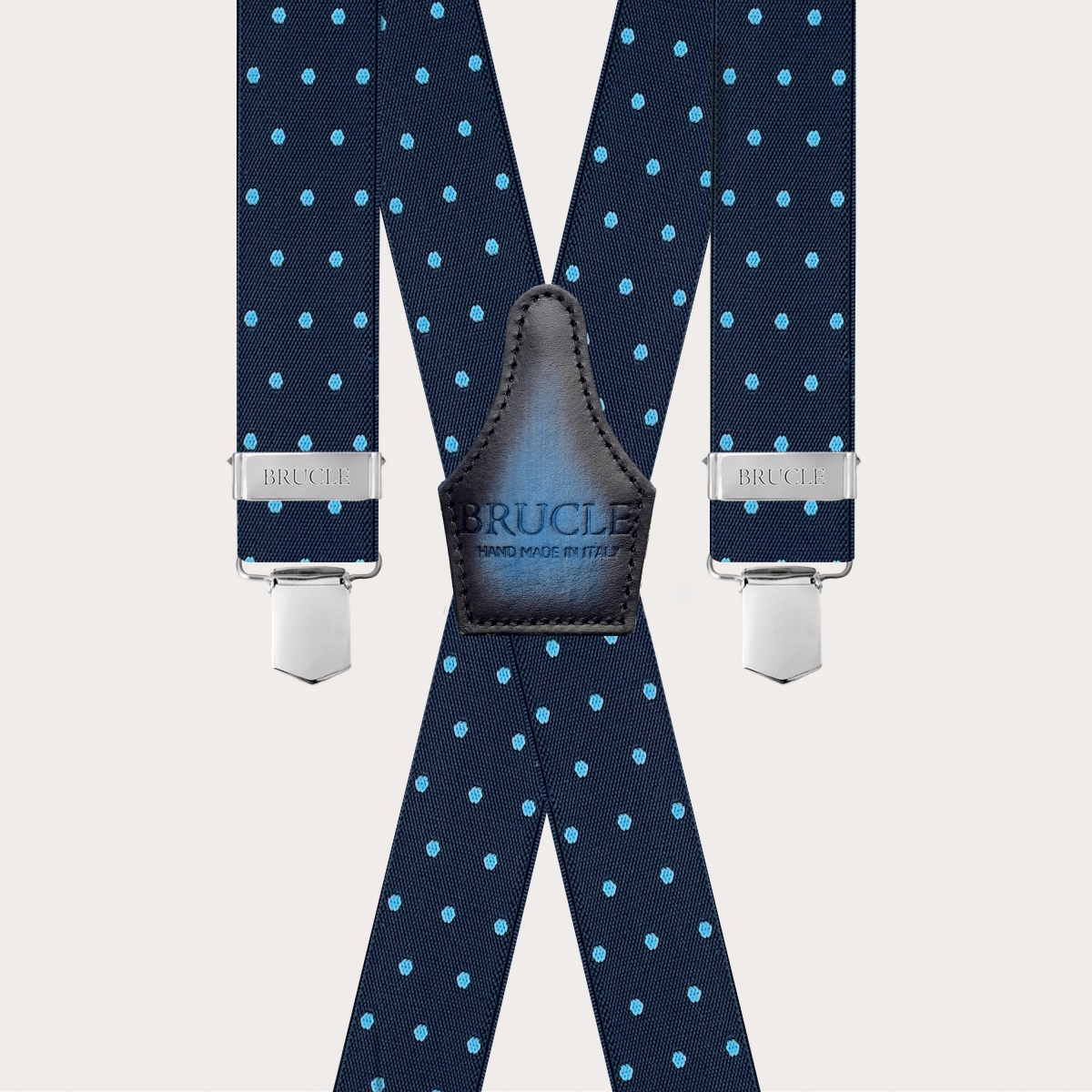 Blue X-back suspenders with light blue polka dots and hand-shaded colored back strap