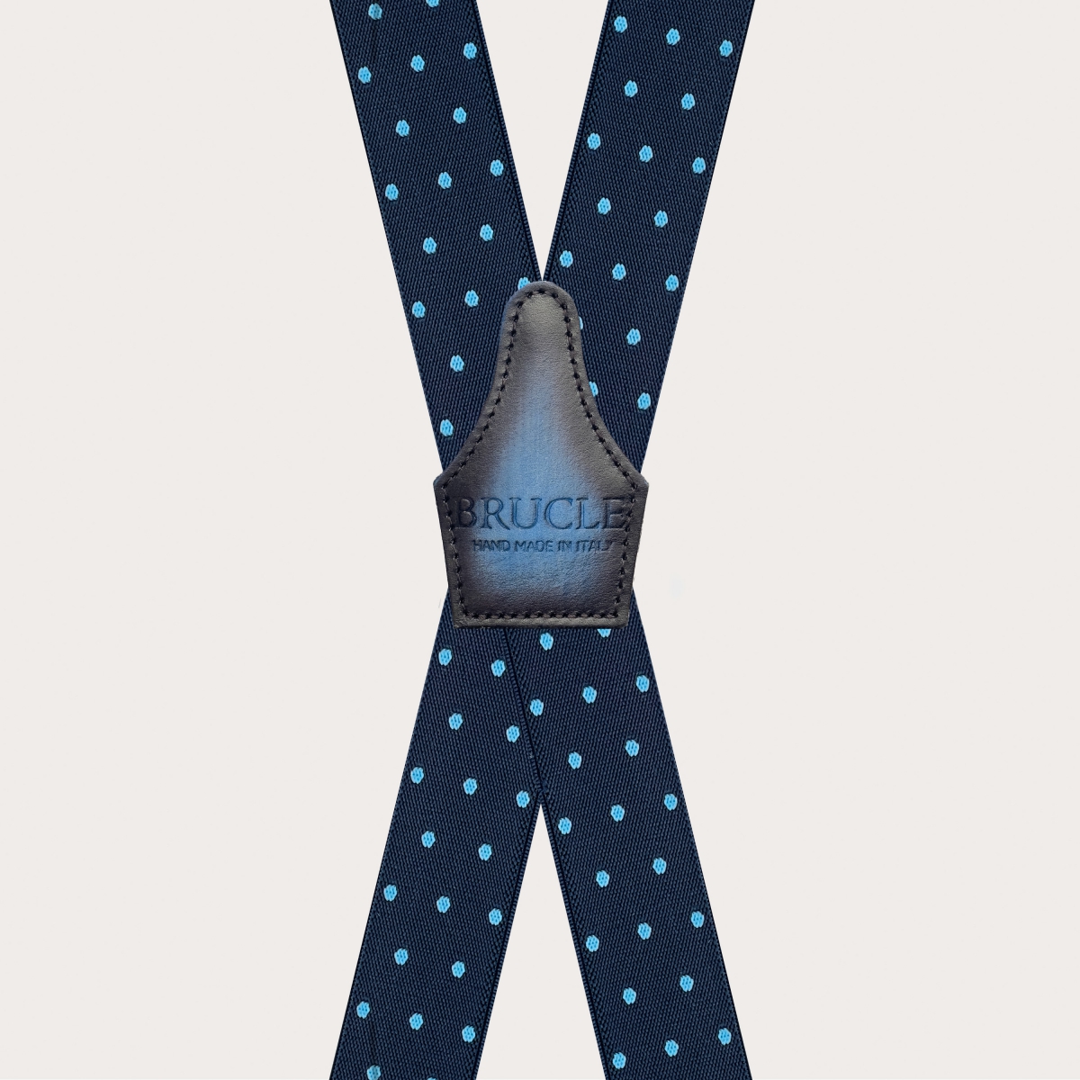Blue X-back suspenders with light blue polka dots and hand-shaded colored back strap