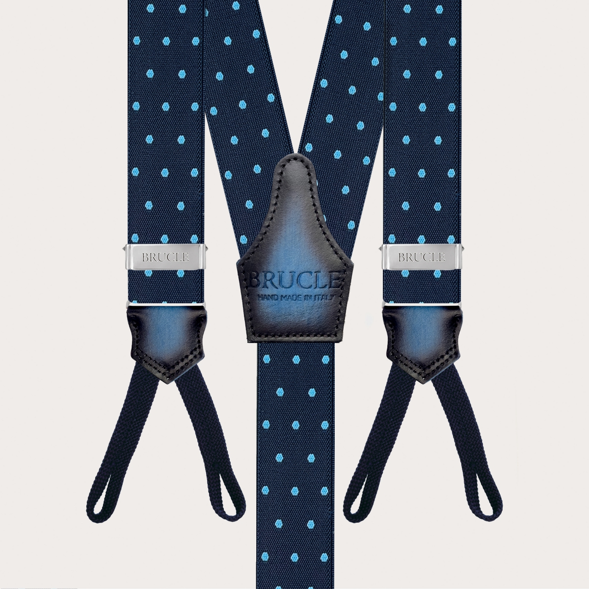 Elegante blaue Hosenträger mit Punkten und Knopfschlaufen