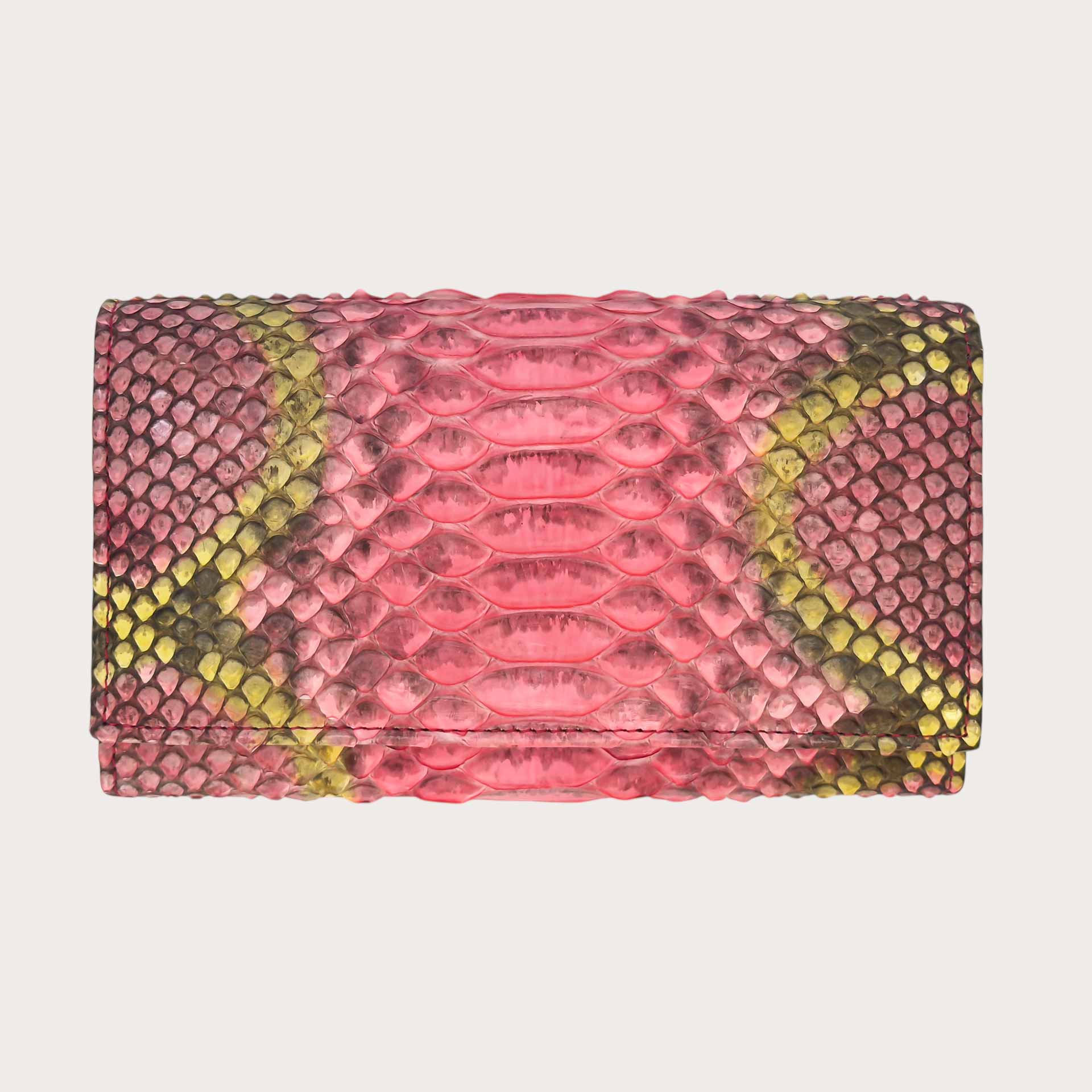 Portefeuille femme à rabat en python patiné rose et jaune