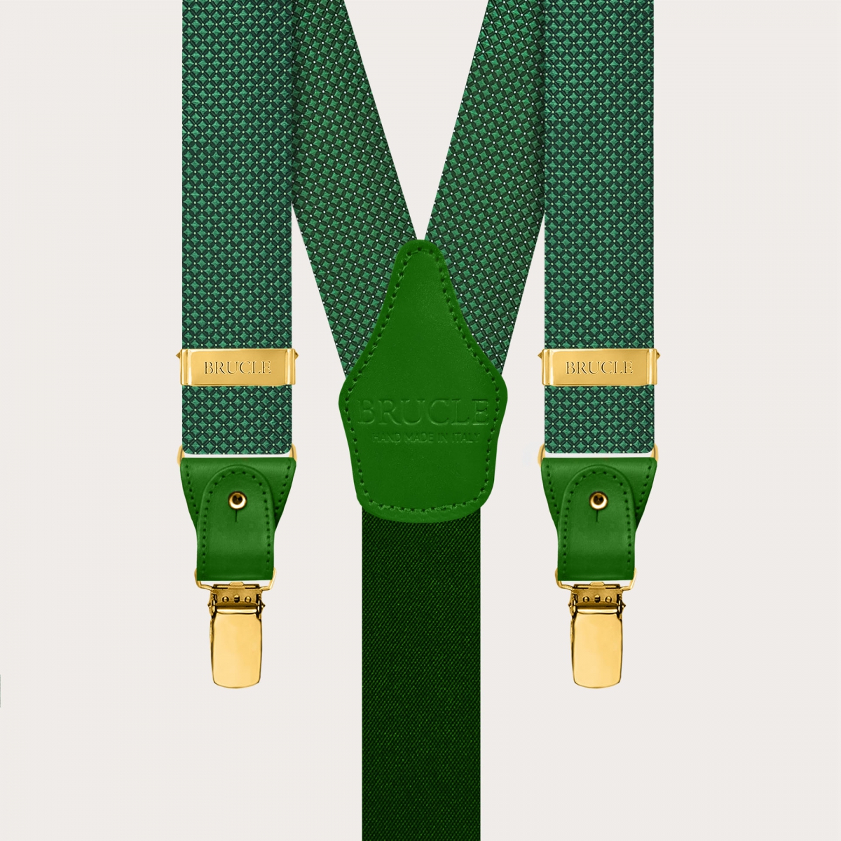 Green pin-dot silk suspenders with gold-tone metal fittings