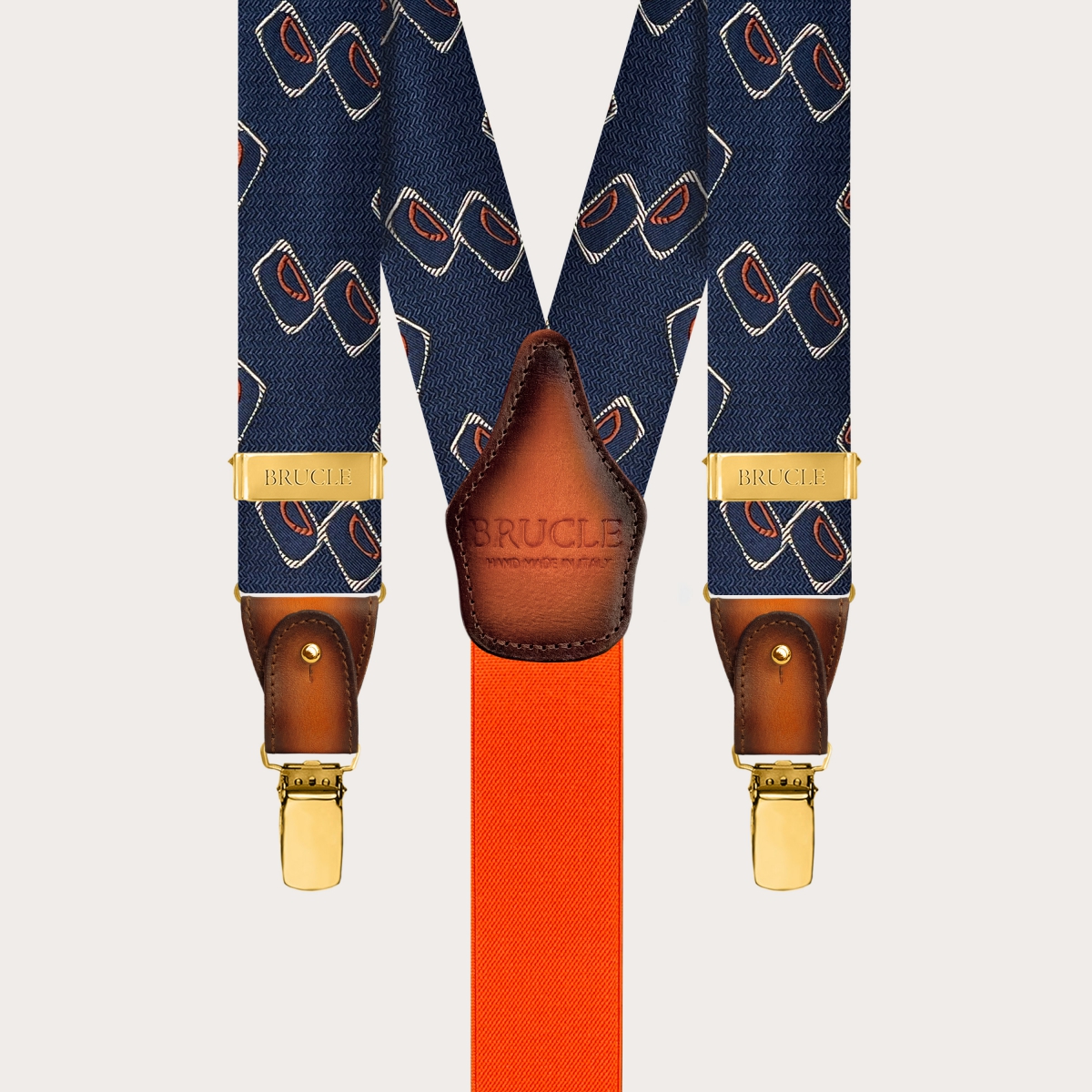 Men’s silk suspenders with blue and orange geometric pattern and gold clips