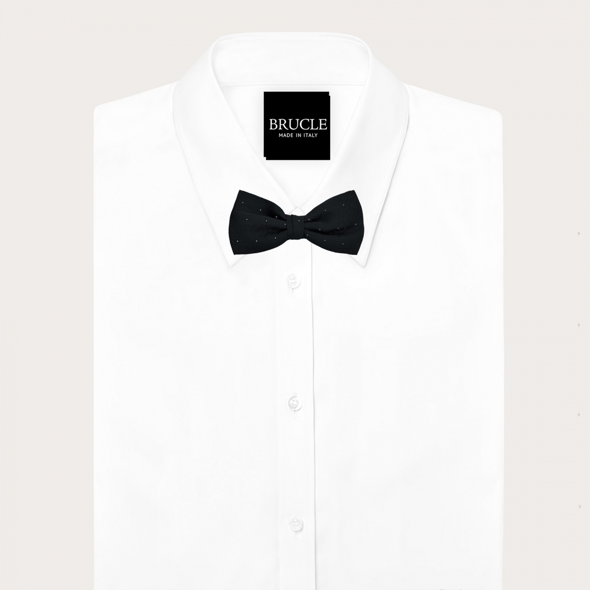 Coordinated set of button suspenders and black paisley bow tie